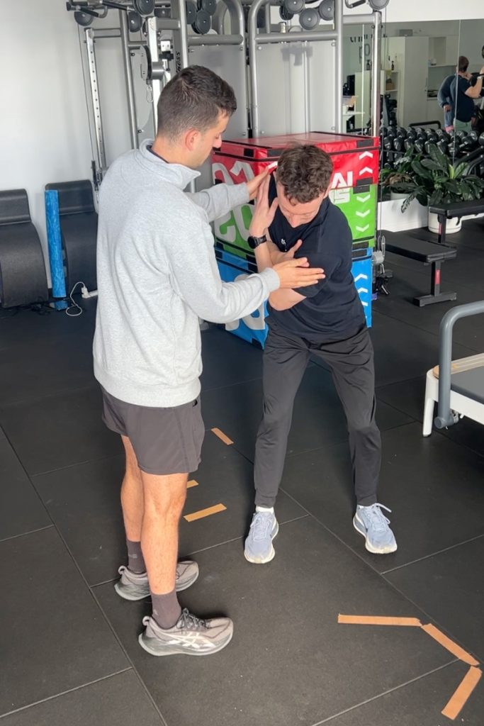 Testing rotation as part of golf physio TPI Screening